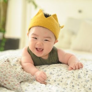 A photo of a smiling infant